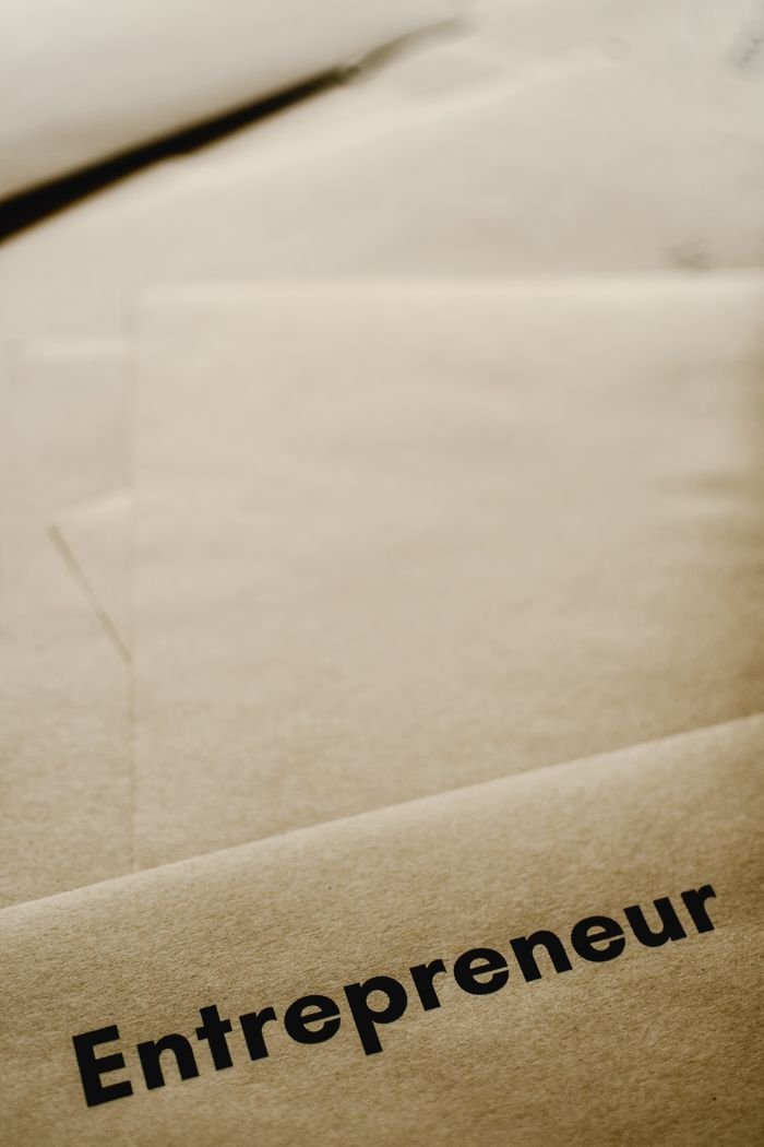 Services A close-up of brown paper with the word 'entrepreneur,' inspiring business and creativity.